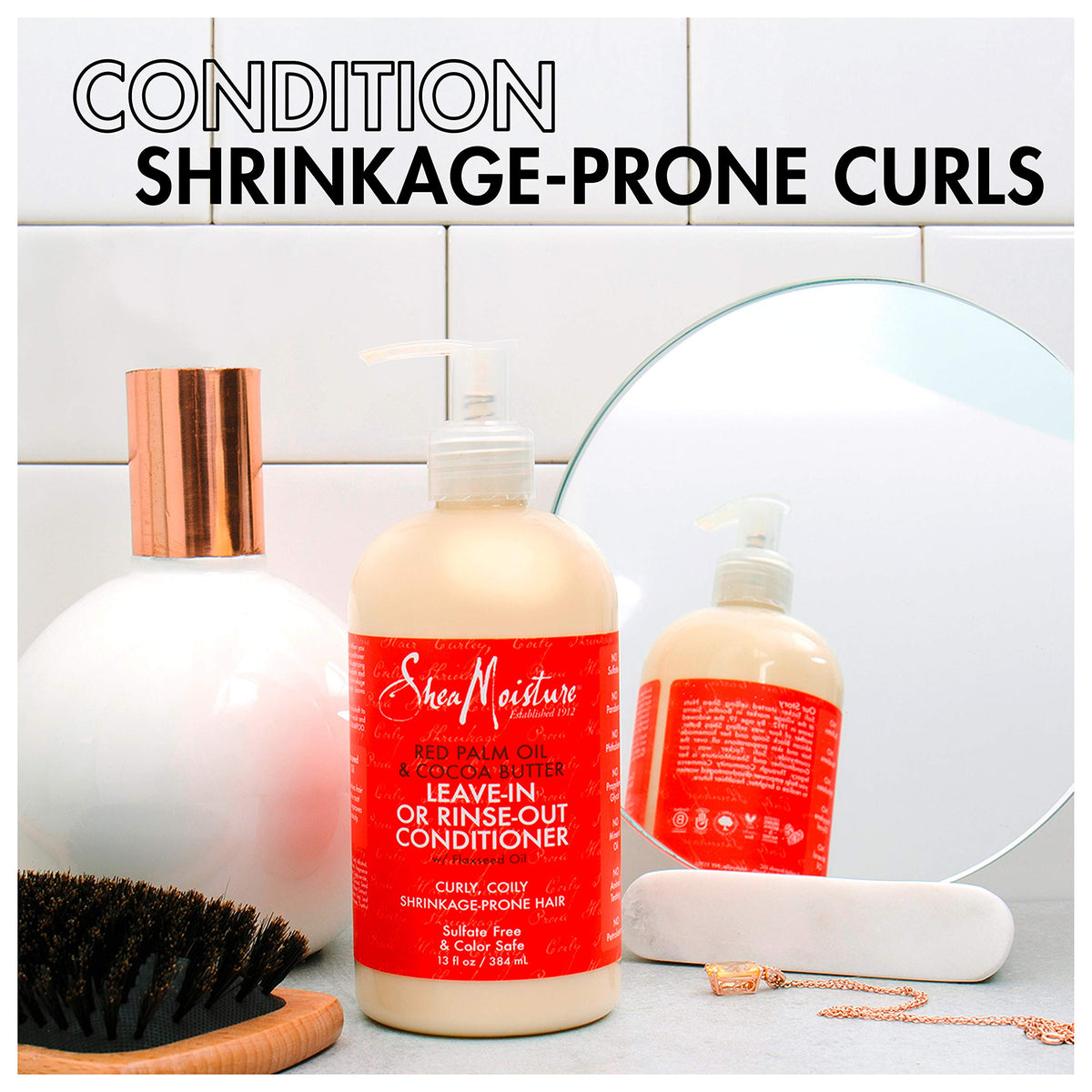 SheaMoisture creamy conditioner texture close-up showing smooth slip for detangling
