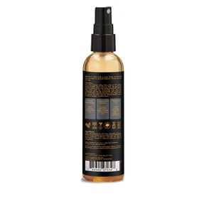 Shea Moisture clear liquid texture drop highlighting lightweight feel
