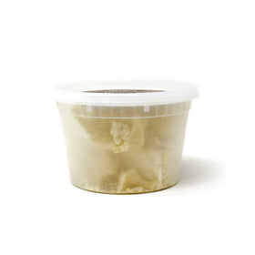Sheanefit close-up of cocoa butter chunks highlighting natural texture