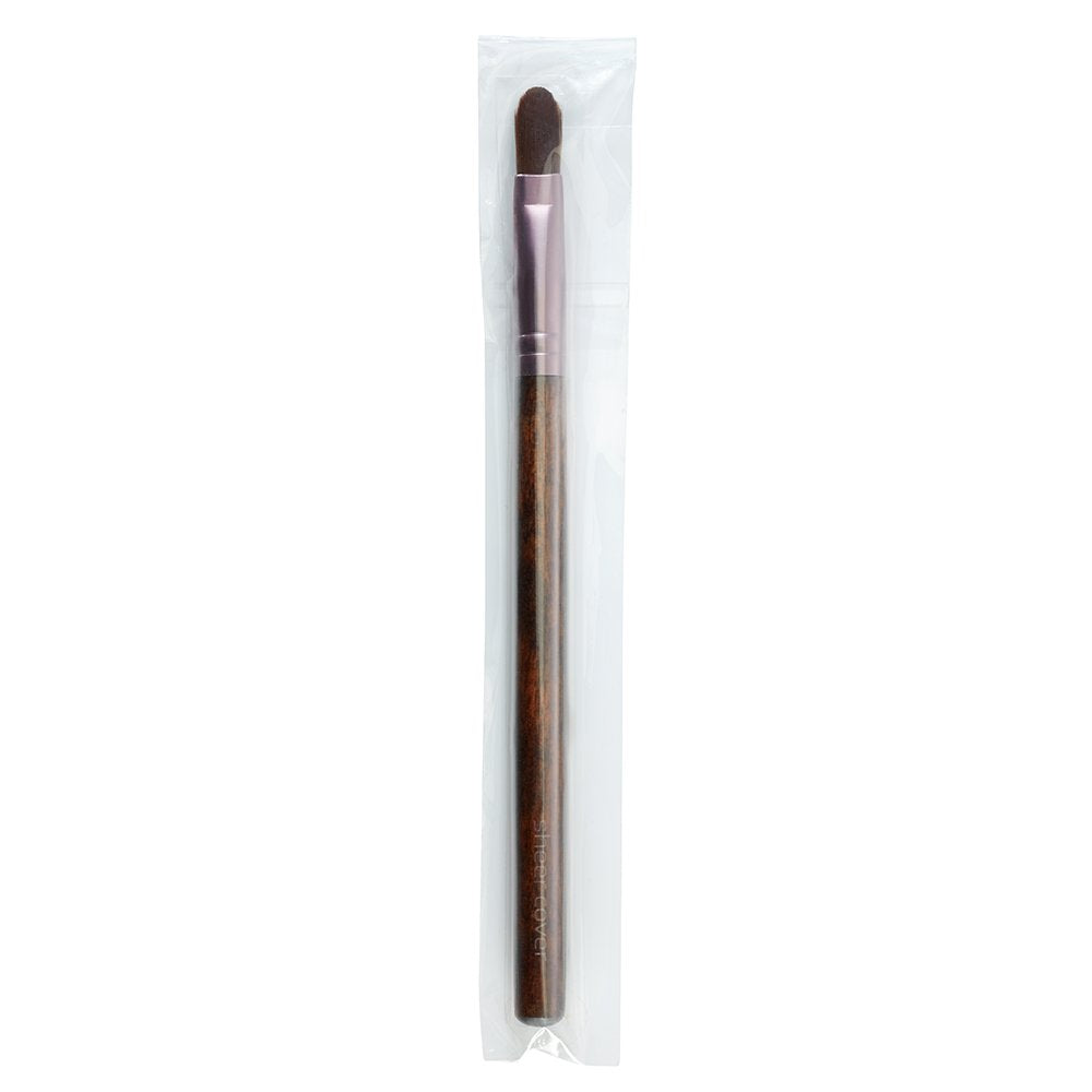 Sheer Cover compact held in hand to show size and travel-friendly convenience