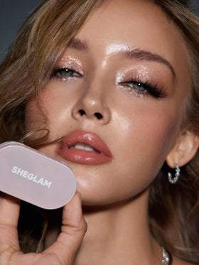 SHEGLAM duo inside evening clutch showing portable glam for touch-ups