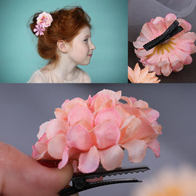 SHEHARUHI flower clips attached to clutch bag adding decorative flair