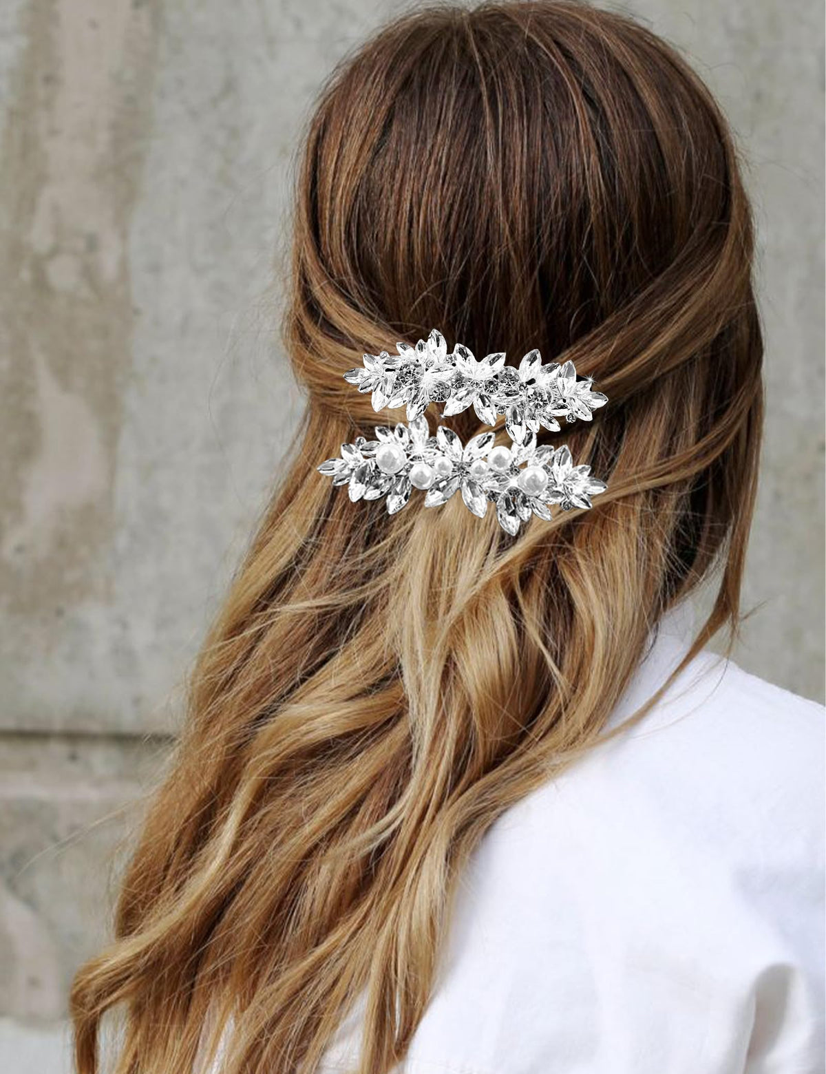 SHEHARUHI hair clip used in a bridal updo adding glam to the hairstyle