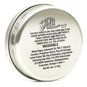 Shiner Gold texture close-up of glossy pomade in palm, demonstrates high-shine finish benefit