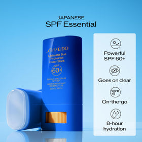 Shiseido clear stick texture close-up showing transparent weightless finish