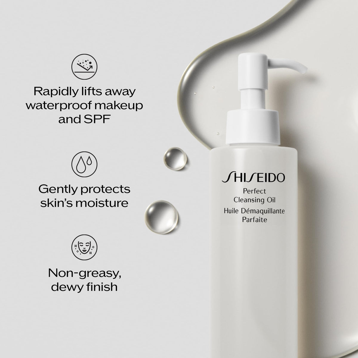 Hand applying Shiseido oil to face demonstrating effective makeup melting