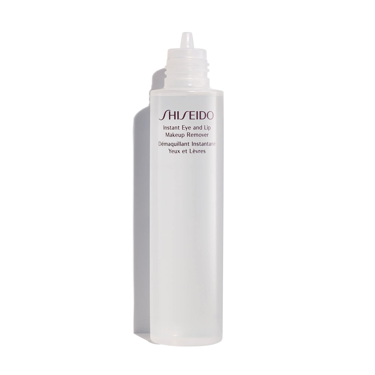 Shiseido remover on cotton pad held near eye showing quick makeup lifting