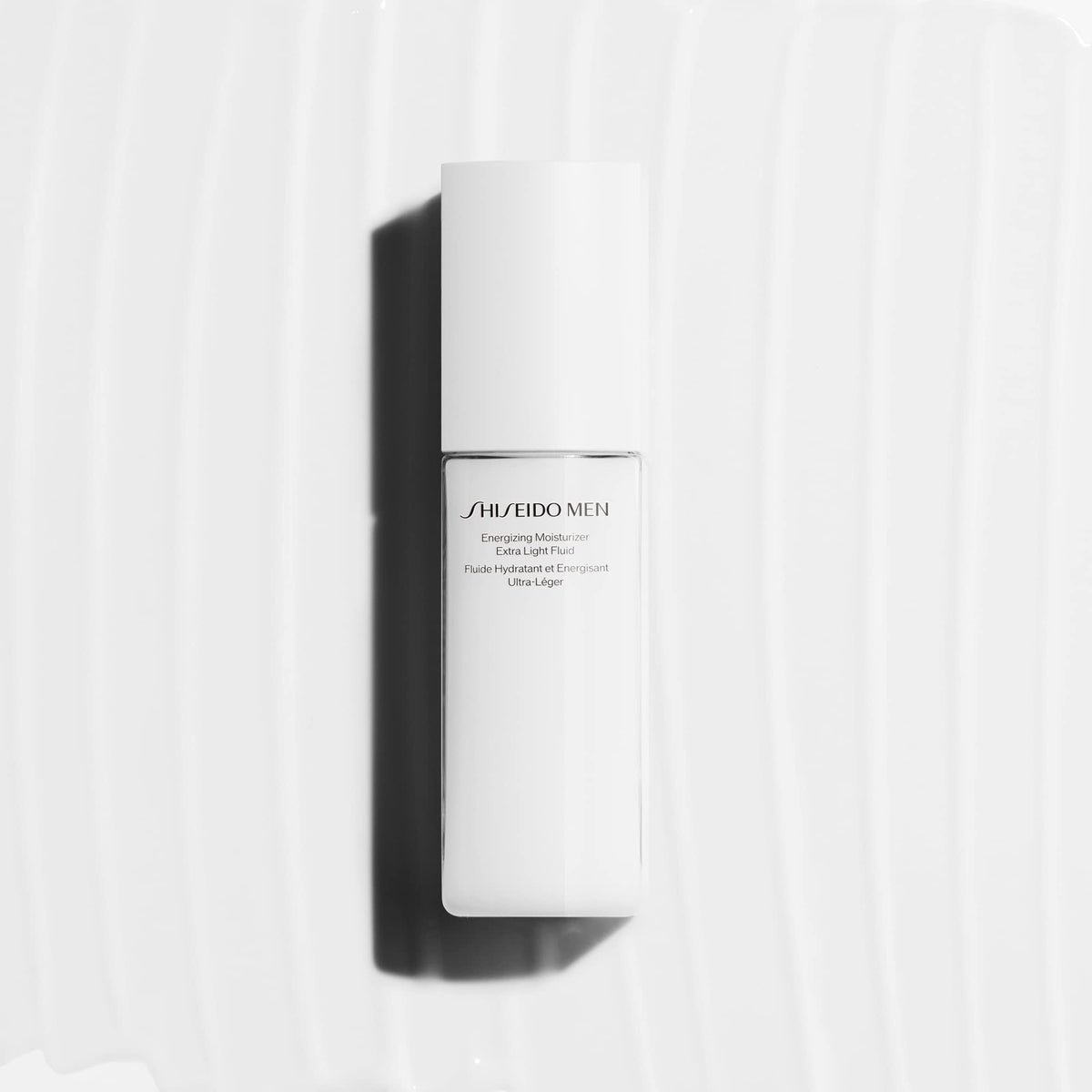 Shiseido moisturizer on hand demonstrating lightweight spreadability