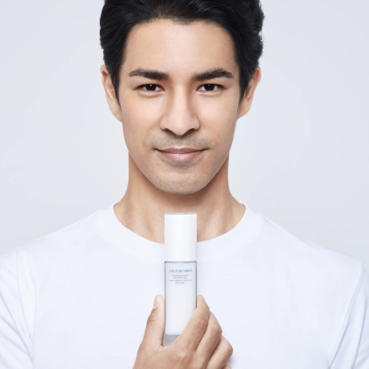 Shiseido product on bathroom counter in morning routine adding quick hydration