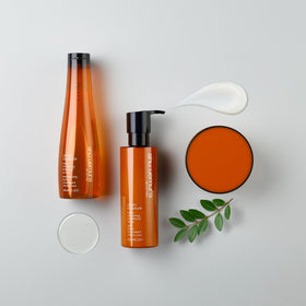 shu uemura art of hair jar on bathroom shelf lifestyle shot conveying salon-quality care