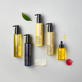 shu uemura art of hair stylist applying cream showing professional results