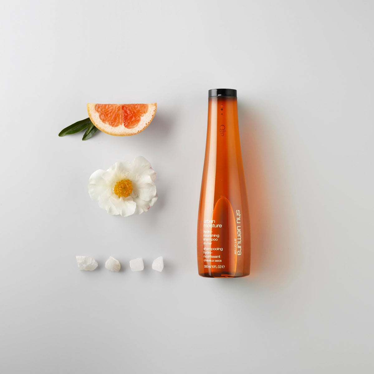shu uemura art of hair shampoo staged in bathroom for hydrated hair benefit
