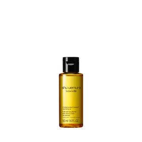 shu uemura bottle front view showing product label and compact size benefit