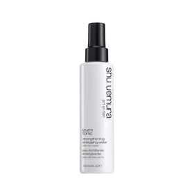 shu uemura art of hair front bottle shot showing sleek packaging and product benefit
