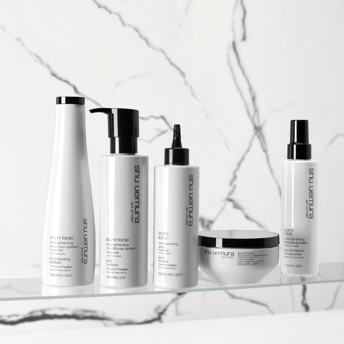 shu uemura art of hair bottle on bathroom shelf lifestyle for daily routine benefit