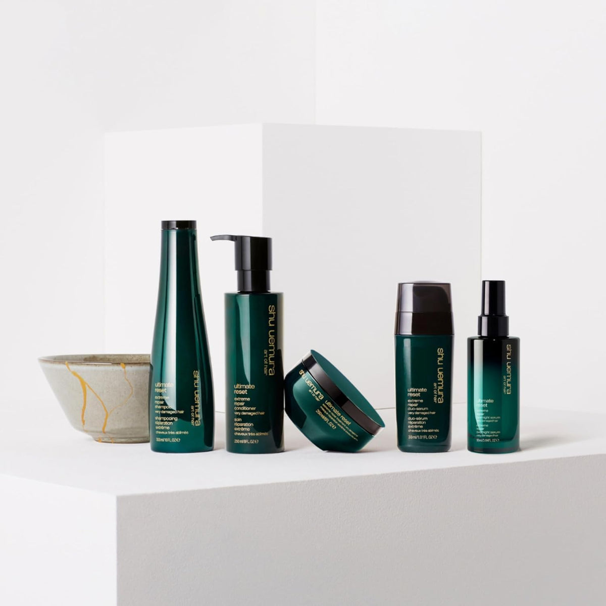 shu uemura art of hair product on bathroom shelf in lifestyle scene indicating luxury routine