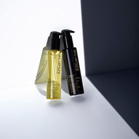 shu uemura art of hair on a bathroom shelf in lifestyle setting for daily use