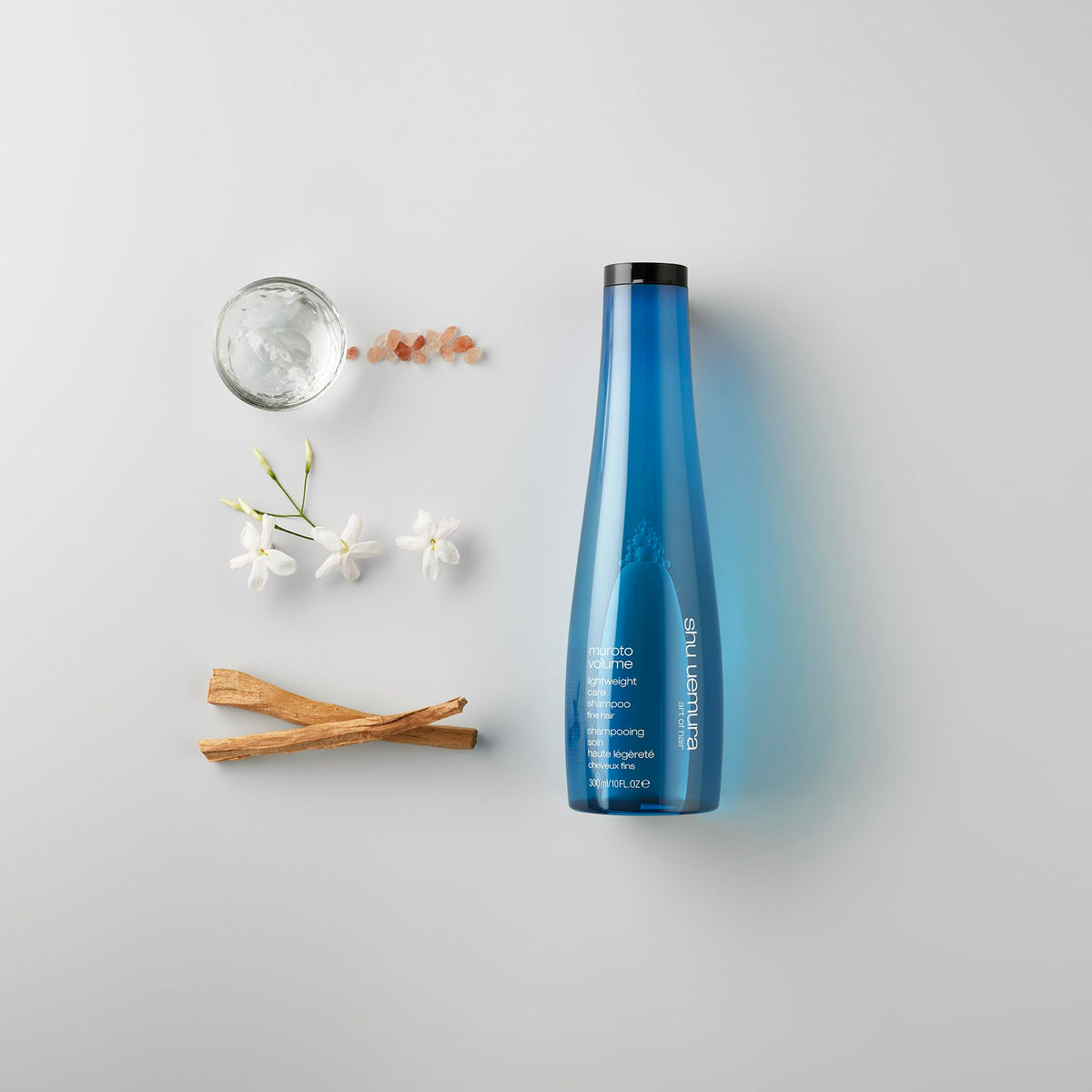 shu uemura next to ruler showing 10 fl oz size and travel practicality