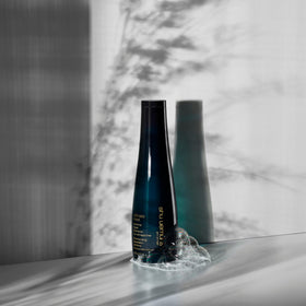shu uemura art of hair shampoo in bathroom setting showing salon-quality ritual