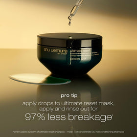 shu uemura product next to travel item showing compact 1.7 fl oz size convenience