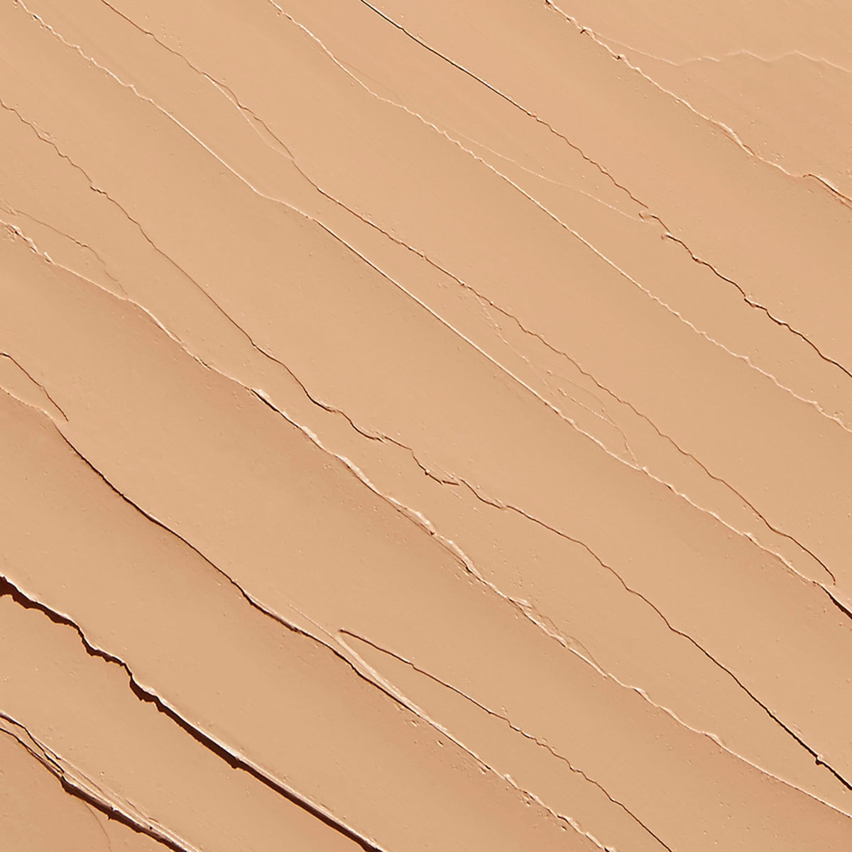 Sigma Beauty in-use application on eyelid showing crease-reducing benefit