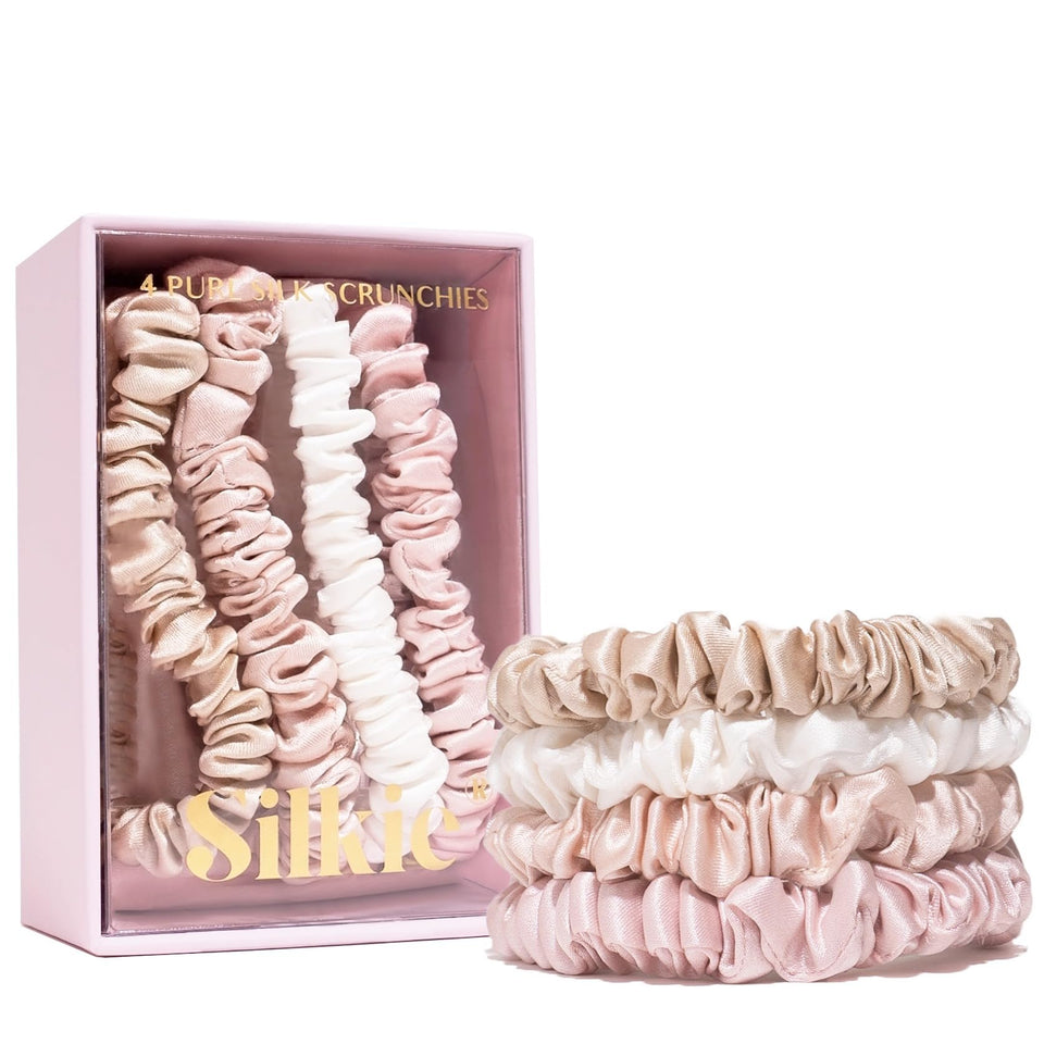 Silkie front view of four nude scrunchies showing neutral tones and neat presentation