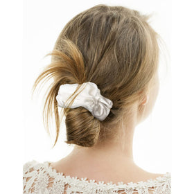 Silmer scrunchies styled on bedside table for lifestyle appeal and daily use benefit