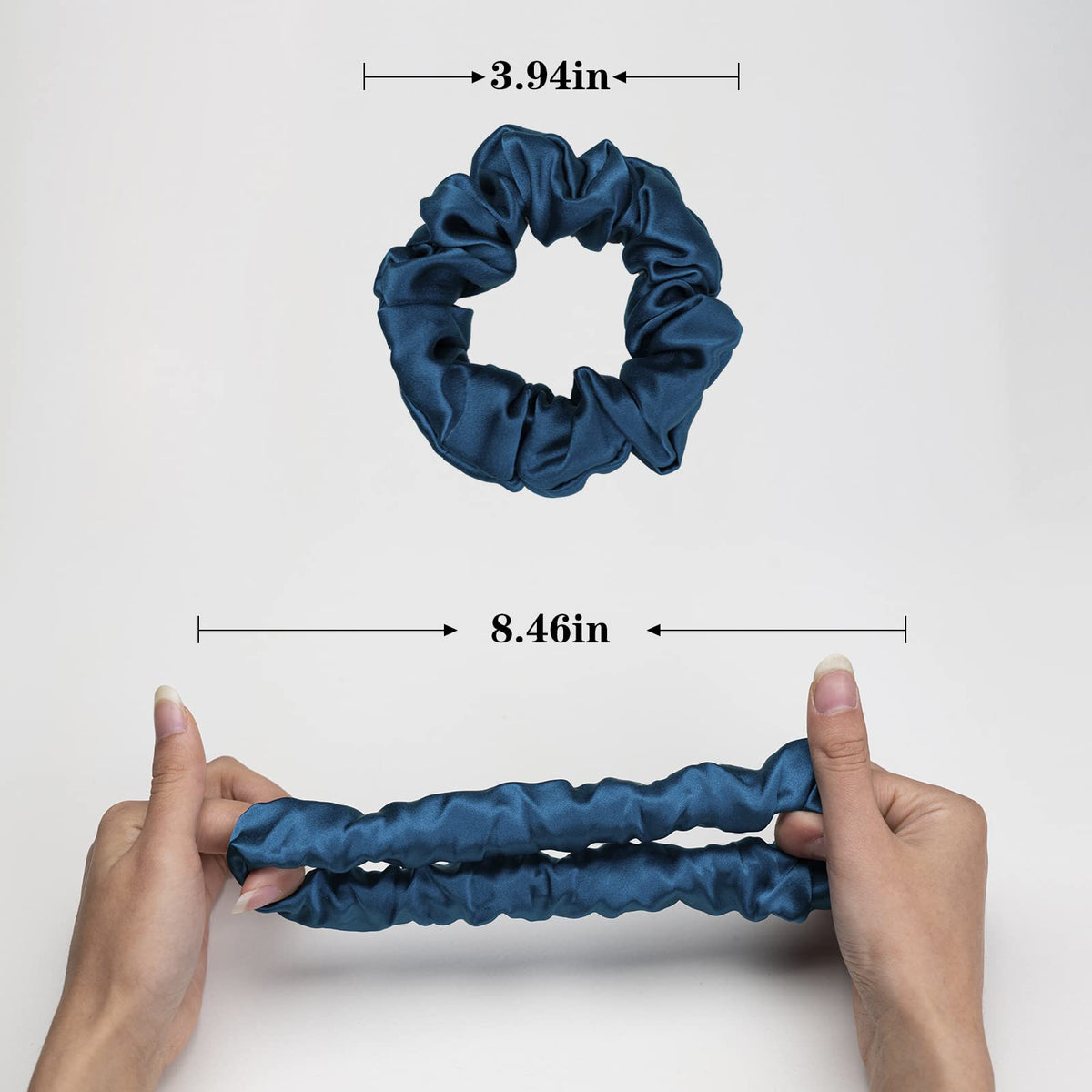 Silmer scrunchie next to a coin illustrating compact size and easy portability