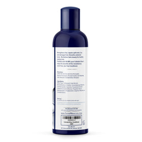 Silver Miracles conditioner texture pouring from bottle showing smooth conditioning benefit
