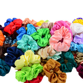 Simnice scrunchies size comparison in hand illustrating stretch and large outer diameter