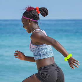 Simnice scrunchie worn on wrist as accessory and easy carry benefit