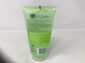Simple product in hand during facial cleansing, demonstrates gentle use