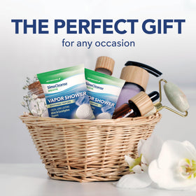 SinuCleanse travel pack inside a toiletry bag showing portability and on-the-go use