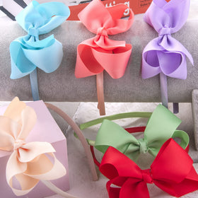 SIQUK headband in hand illustrating compact size and easy storage
