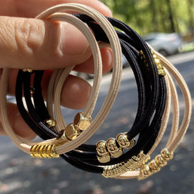 SISYOUP hair tie worn as bracelet on wrist for on-the-go styling