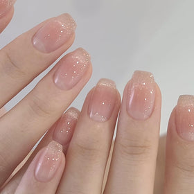 Skiennix removal scene with soak and cuticle stick, illustrates gentle removal