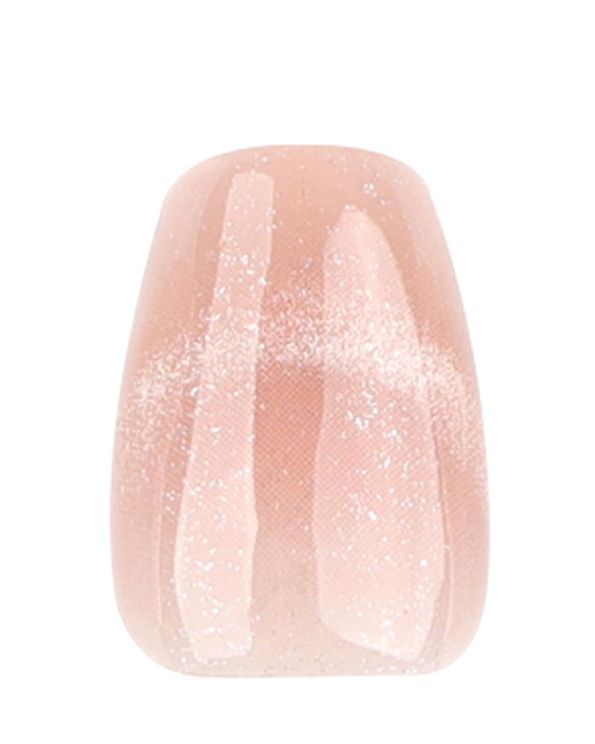 Skiennix nail next to finger for scale, clarifies short square length and size