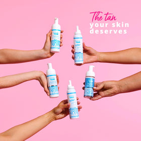 SKIN & TAN in a beach bag lifestyle scene conveying sunless confidence and glow