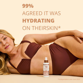 SKIN & TAN bottle in hand illustrates 4.9 oz travel-friendly size
