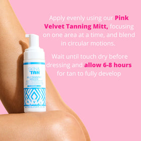 SKIN & TAN bottle held in hand to show 5.2 oz size and travel-friendly convenience