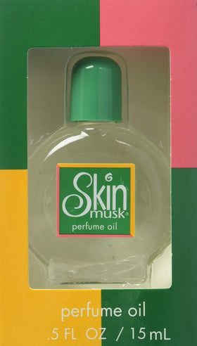Skin Musk on vanity with styling props demonstrating elegant everyday use