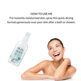 Skin So Soft spraying on leg after shower for fast-absorbing moisture