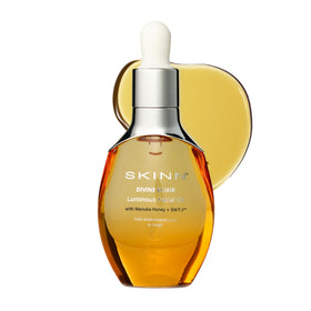 SKINN bottle front packaging showing luminous face oil and benefits