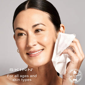SKINN wipes staged on bathroom counter for travel-ready convenience
