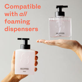 Skipper foaming dispenser in use producing rich foam for faster hand cleaning