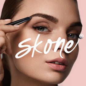 Skone pigment stroke on skin illustrating rich Chocolate color payoff