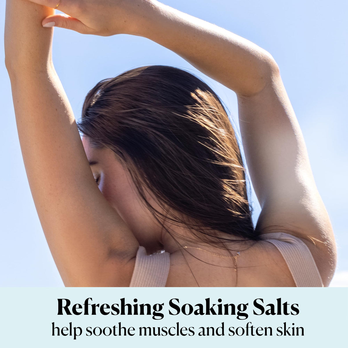 Sky Organics bath lifestyle with towel and candle conveying relaxing self-care ritual