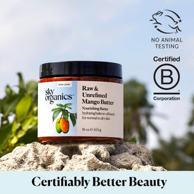 Rubbing Sky Organics mango butter into dry elbow to soften and nourish skin