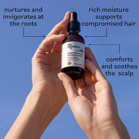 Sky Organics applied to scalp during massage showing targeted nourishment and soothing