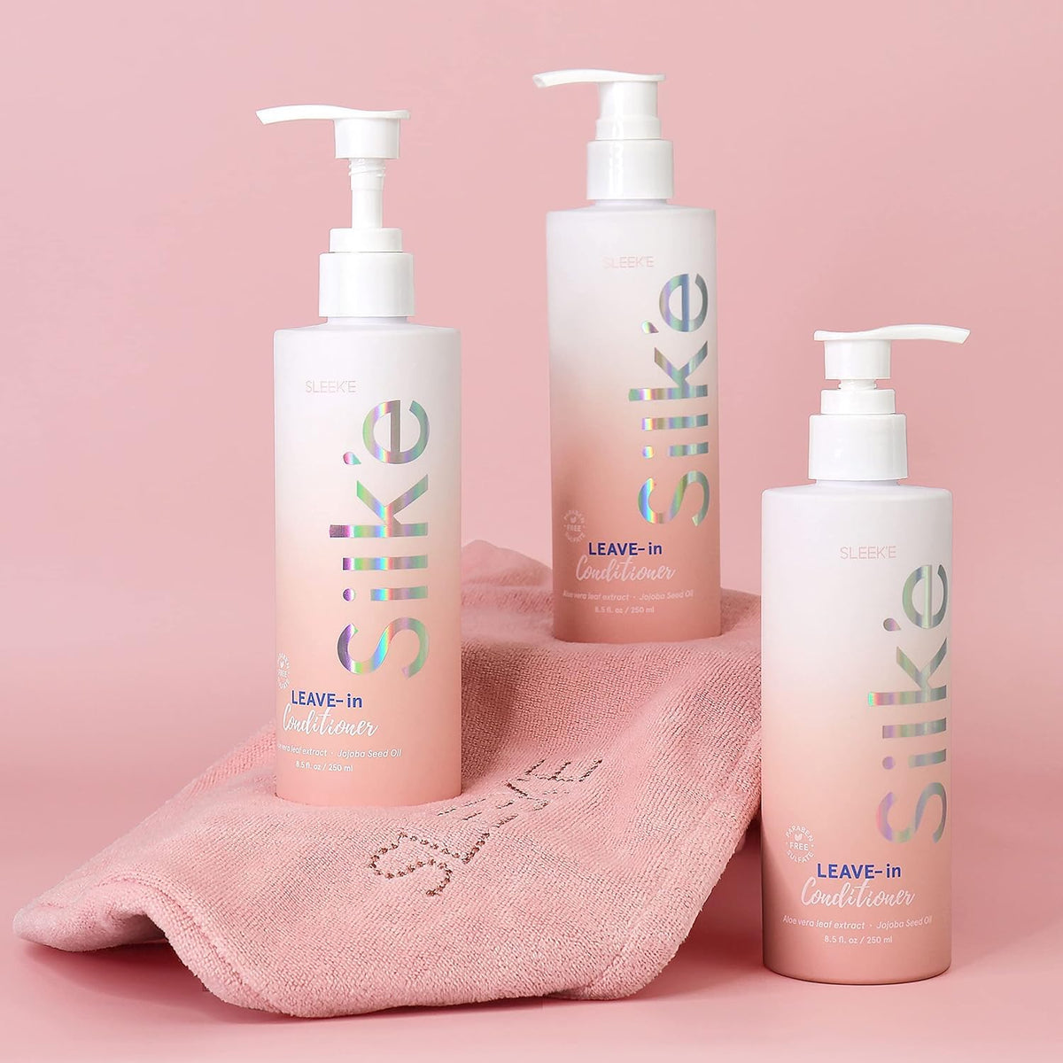 Sleek'e Silk'e held in hand to show 250ml scale and travel-friendly convenience